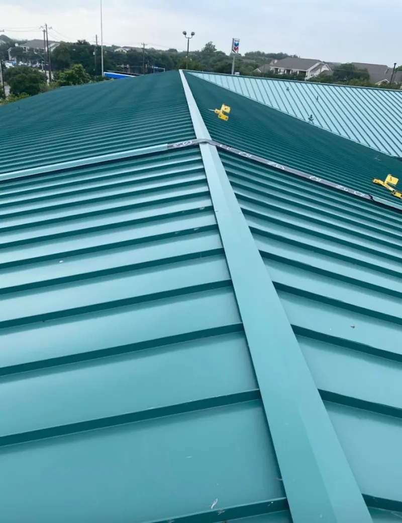 Green commercial metal roof ridge and valley for Metal Roof Repair in Willow Springs